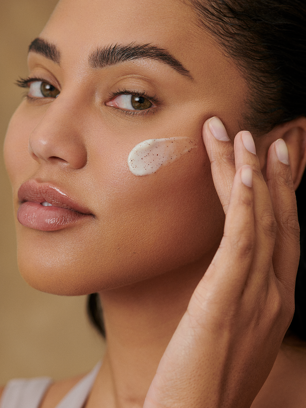 Ayesha Curry applying Pava Exfoliating Cleanser Ayesha Curry applying Pava Exfoliating Cleanser