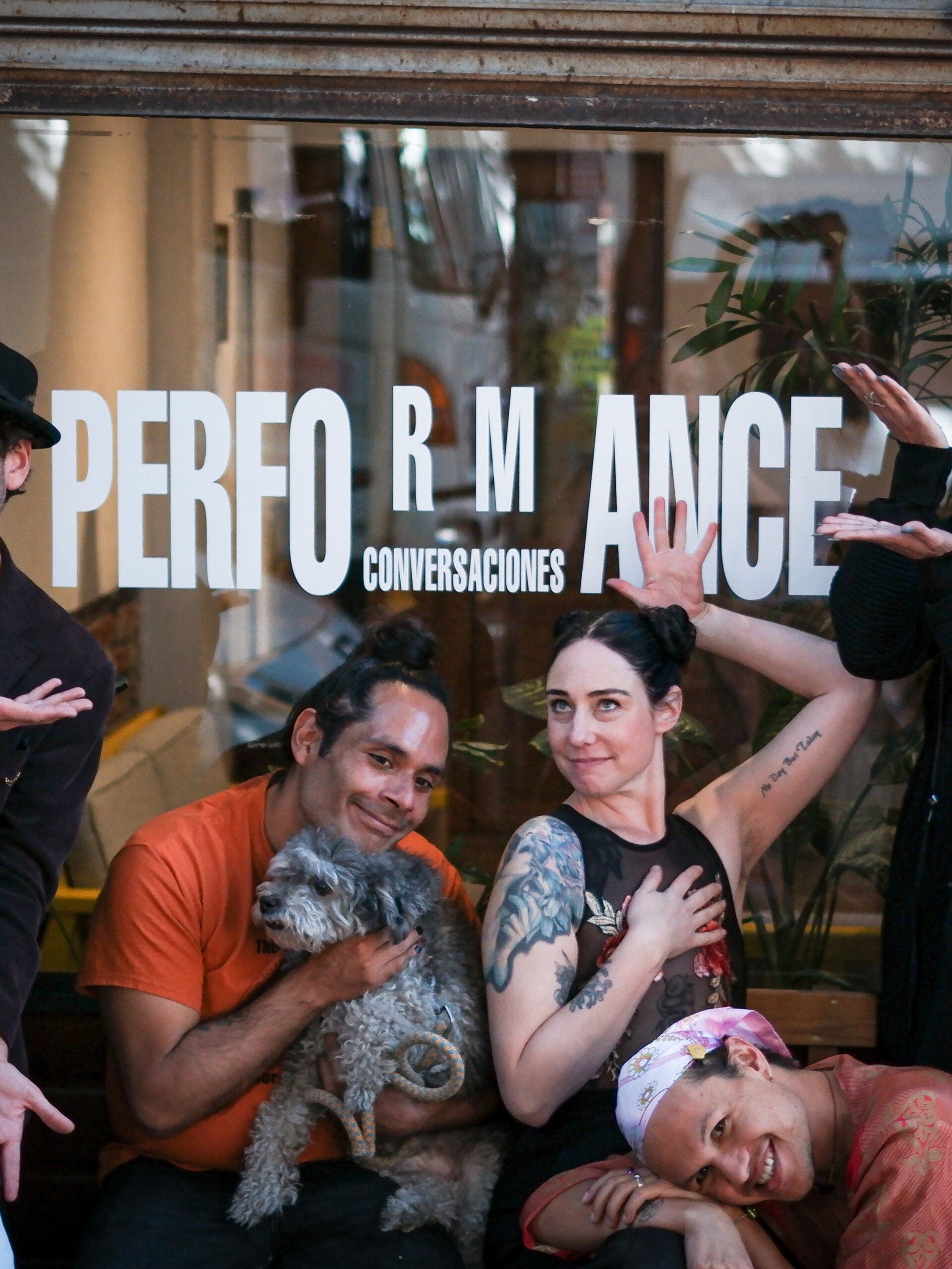 A collaborative, joyous photo of the founders of Performance Conversaciones, a space for artist-led projects.