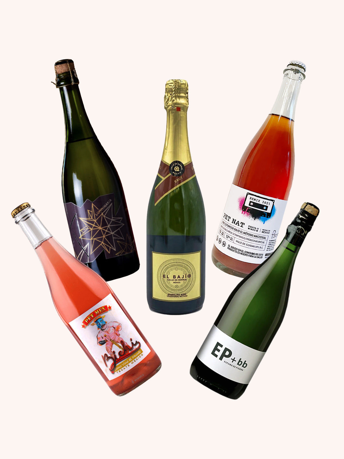 Five bottles of diverse Mexican sparkling wines create a festive mood, perfect for a Cinco de Mayo celebration.
