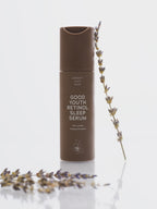 Brown retinol sleep serum by Sweet July Skin with a lavender sprig.