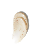 Creamy exfoliating scrub by some brand with brown specks throughout.