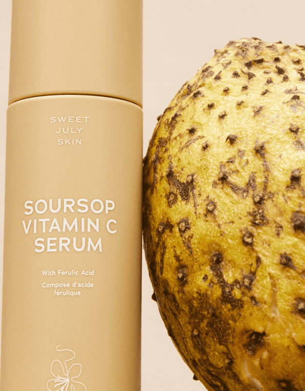 Soursop Vitamin C Serum close up next to Soursop Fruit