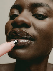 Sweet July Skin hydrating lip treatment being applied