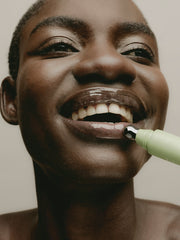 Sweet July Skin hydrating lip treatment being applied