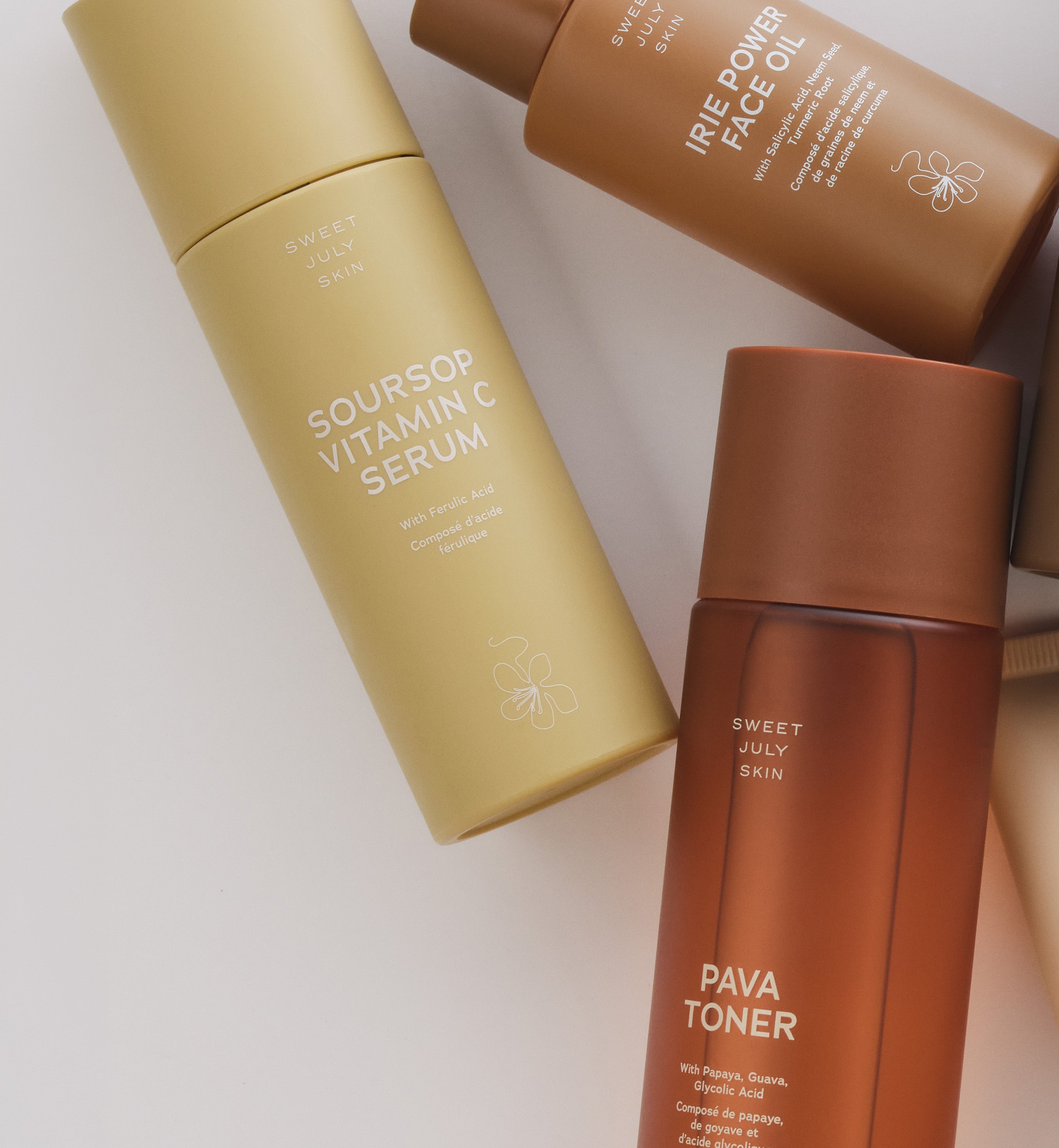 Sweet July daily skincare formulas laying on a white background